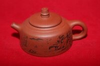 Глиняный чайник