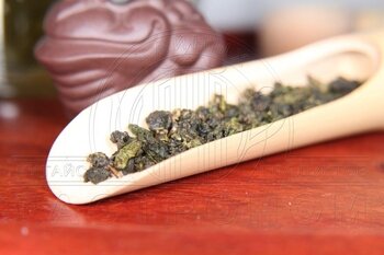 Най Сянь Цзинь Сюань «Огненный цветок» Молочный улун